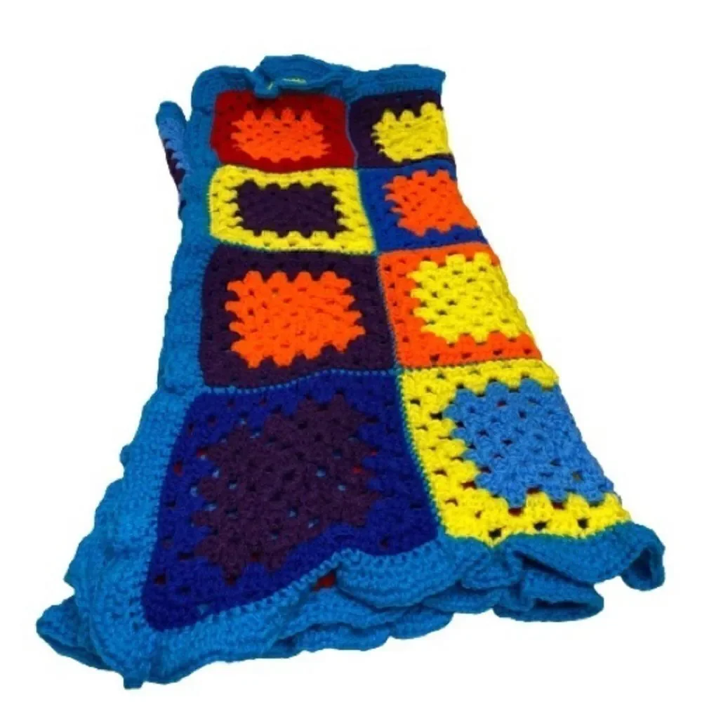 Hand crocheted bright multi colored Afghan size 56” X 31”